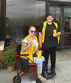 Ashley Traylor collaborating with Autism Society of the Quad Cities at a local advocacy event